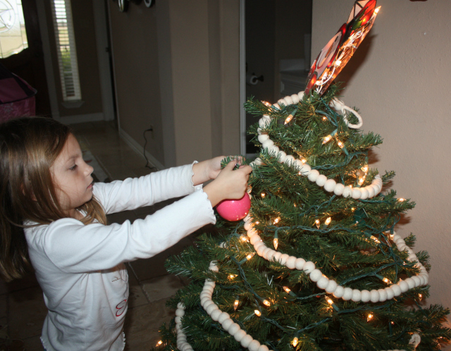 emma decorating her tree